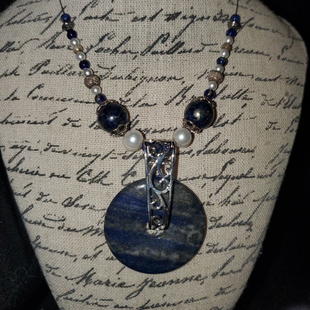 Lapis Lazuli "donut" floating necklace with accent beads and magnetic clasp